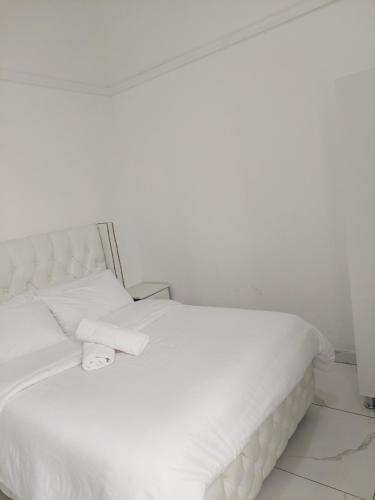 Ένα ή περισσότερα κρεβάτια σε δωμάτιο στο De Dreamz Guest House