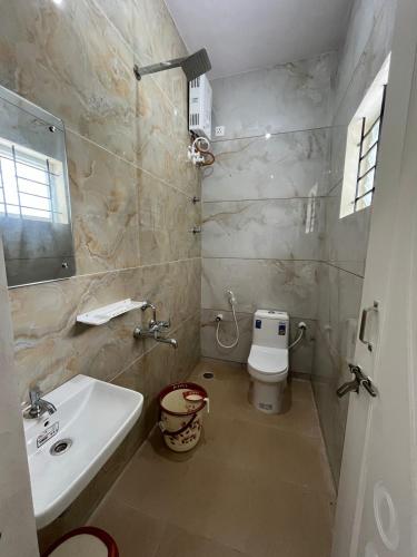 Koupelna v ubytování Sriram Guesthouse Chikmagaluru