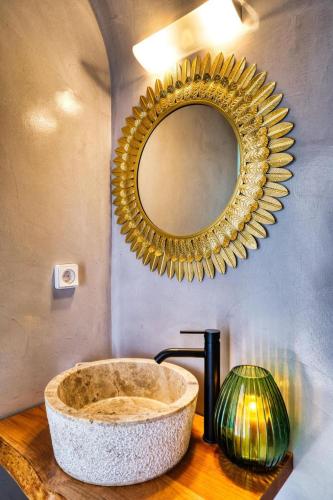 a bathroom with a large sink and a mirror at Panoramic Villa in Akrotiri with Stunning Views in Akrotiri