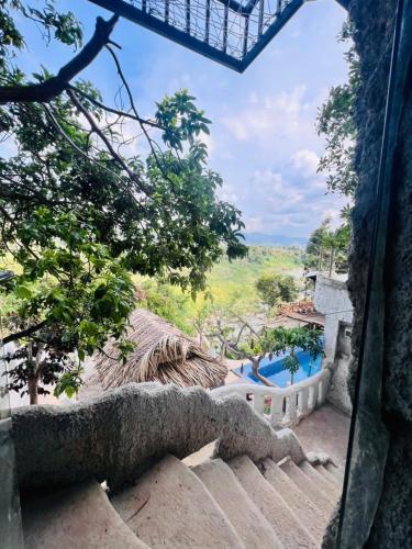 a view of a pool at a resort at Homestay Thác Liên Khương in Ðưc Trọng