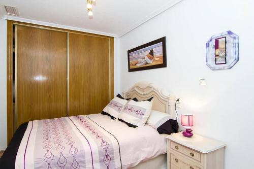Letto o letti in una camera di Yovalutres
