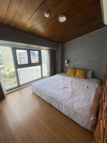 Katil atau katil-katil dalam bilik di The H House Quy Nhơn