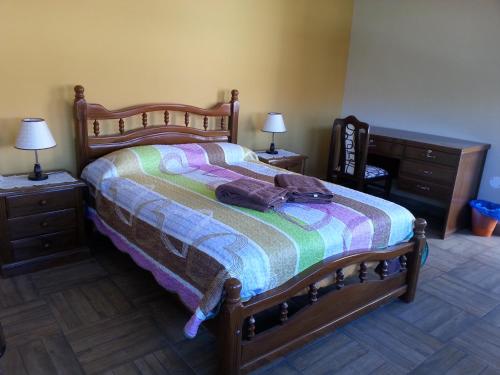 Кровать или кровати в номере Villa Oropeza Hostel