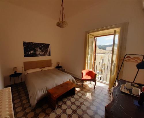 Postel nebo postele na pokoji v ubytování Residenza Donnafugata B&B