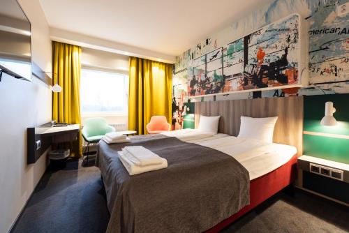 Un ou plusieurs lits dans un hébergement de l'établissement Good Morning Arlanda