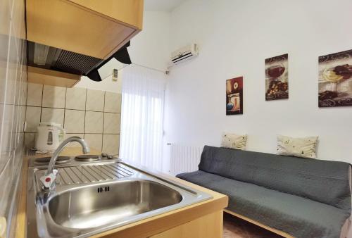 Kuchyň nebo kuchyňský kout v ubytování LiLu Apartments