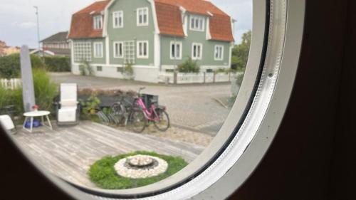 a view of a house from a window at Villa South Beach in Karlskrona