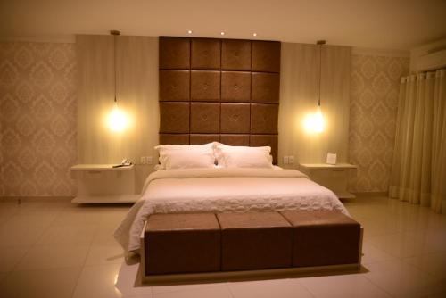 Postel nebo postele na pokoji v ubytování Granterrara Hotel