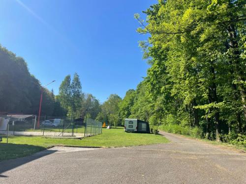 a trailer parked on the side of a road at ATC Kemp Kajlovec in Hradec nad Moravici