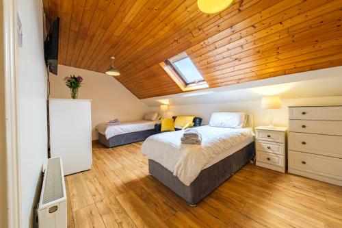 Postel nebo postele na pokoji v ubytování Steepleview 2 Bedroom