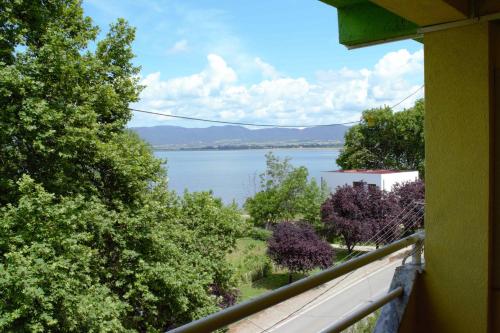 a view of a lake from a house at Maria 2 in Star Dojran