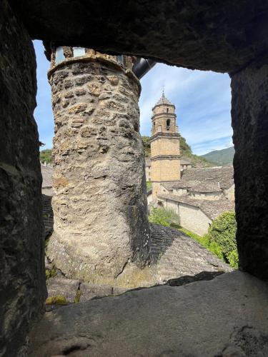 a view from a window of a castle with a tower at Fonda Carrera in Labuerda