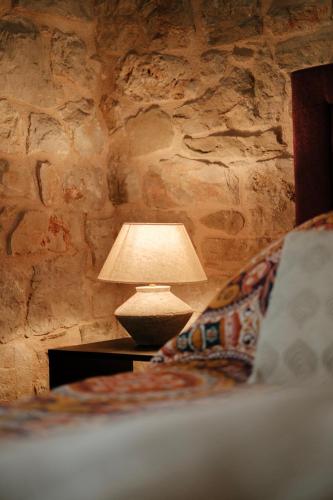 Ένα ή περισσότερα κρεβάτια σε δωμάτιο στο Bliss Stone House in Hvar with private padel court