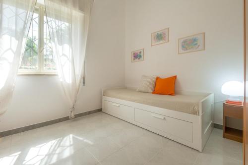 Ένα ή περισσότερα κρεβάτια σε δωμάτιο στο Villa AnnaRò