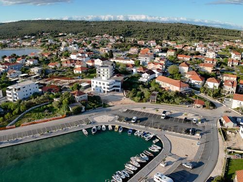 an aerial view of a harbor with boats in the water at Holiday Home Marijana by Interhome in Sukošan