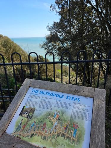 a interpretive sign in front of a fence at Sleek & Vibrant - 8ight Havens Folkestone in Folkestone
