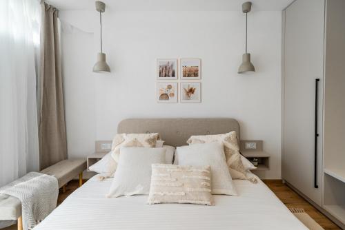 Postel nebo postele na pokoji v ubytování Geri Harmony Home