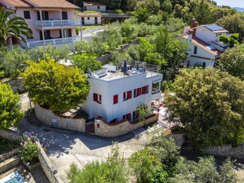 an aerial view of a house with trees at Holiday Home Villa Dragica by Interhome in Labin
