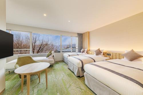Postel nebo postele na pokoji v ubytování KAMENOI HOTEL Nagatoro Yorii