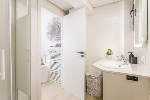 Phòng tắm tại Apartamento con aire acondicionado y gran piscina!