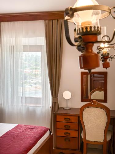 Una cama o camas en una habitación de Hotel Palata Venezia