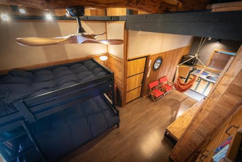 Una cama o camas en una habitación de SLEEPY MOUNTAIN