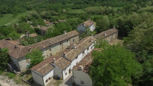 an aerial view of an old house with roofs at Stone House Kotli in Kotli