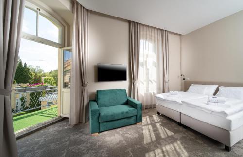 Postel nebo postele na pokoji v ubytování Esplanade, dependance hotelu Monti Spa