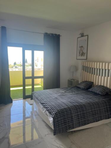 Postel nebo postele na pokoji v ubytování Amazing Sea View Studio w Pool