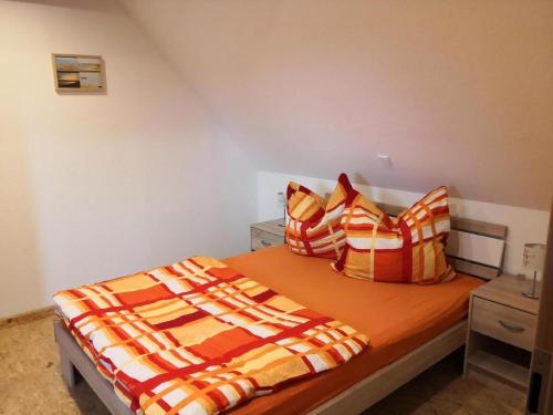 Postel nebo postele na pokoji v ubytování Ferienwohnung Haus Am Wasser In Emden