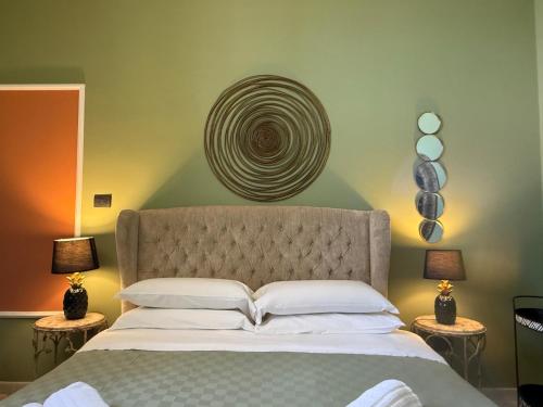 Un ou plusieurs lits dans un hébergement de l'établissement Panorama Suites Noto - Adults Only