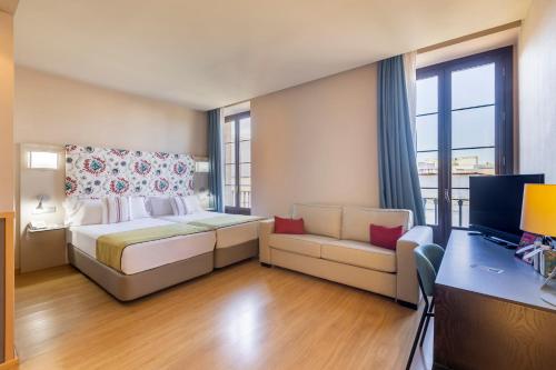 Postel nebo postele na pokoji v ubytování Itaca Jerez by Soho Boutique