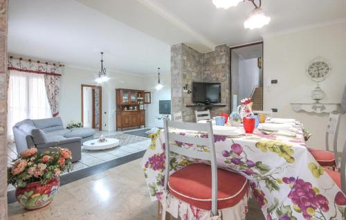a living room with a dining table and a living room at Villa Angela Holiday Apartment in Angri