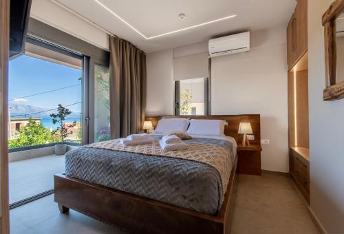 Ένα ή περισσότερα κρεβάτια σε δωμάτιο στο September15 Suites, Lefkada-Nikiana