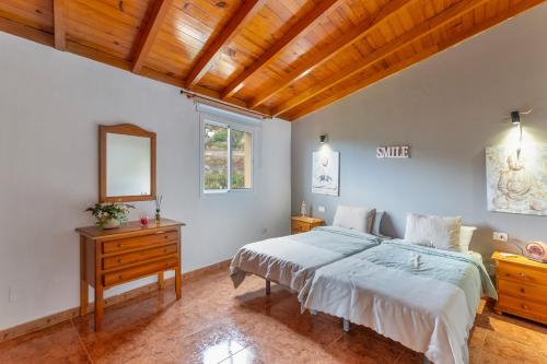 Ένα ή περισσότερα κρεβάτια σε δωμάτιο στο Villa Eden