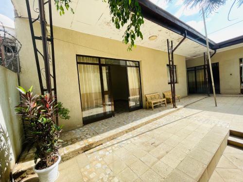 an outside view of a building with a patio at Bete Selam in Bahir Dar