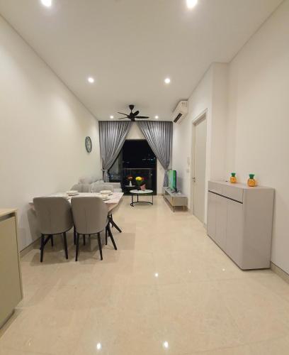 a kitchen and dining room with a table and chairs at LUCENTIA RESIDENCE By LALAPORT in Kuala Lumpur