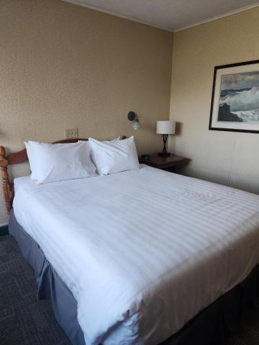 Katil atau katil-katil dalam bilik di Travelodge by Wyndham Amherst