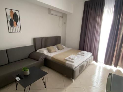 Postel nebo postele na pokoji v ubytování Apartament Niko shengjin