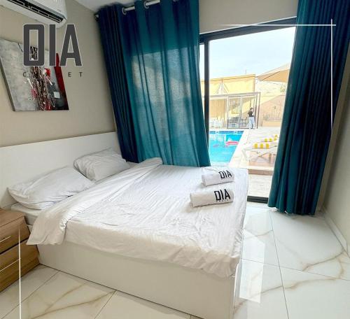 Ένα ή περισσότερα κρεβάτια σε δωμάτιο στο Oia chalet