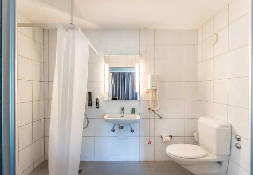 Koupelna v ubytování B&B HOTEL Rothrist Olten