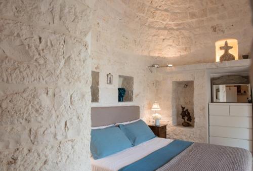 Postel nebo postele na pokoji v ubytování Il Trullo di Ben
