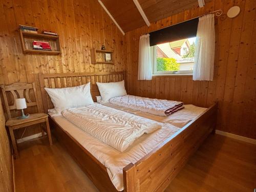 En eller flere senge i et værelse på Seepferdchen