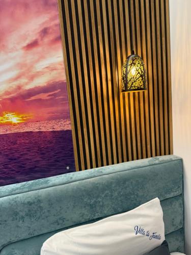 a room with a window with a view of the ocean at Vila La Familia in Ksamil