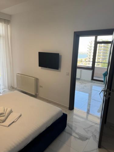 Katil atau katil-katil dalam bilik di VIRGO SEA VIEW Apartaments Summerland