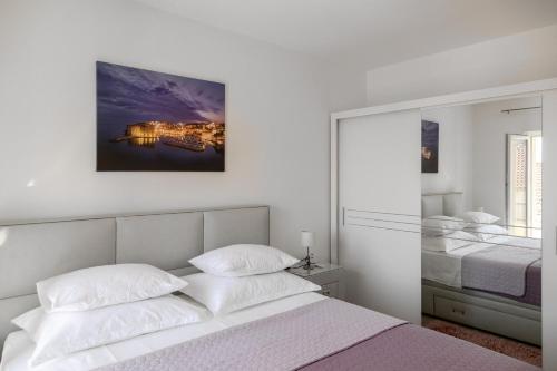 Posteľ alebo postele v izbe v ubytovaní Apartment Pavlović