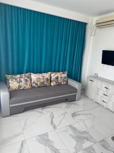 Televisyen dan/atau pusat hiburan di VIRGO SEA VIEW Apartaments Summerland
