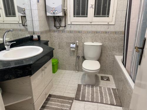 Ванная комната в Executive one bedroom apartment in Zamalek