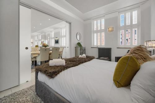 Ένα ή περισσότερα κρεβάτια σε δωμάτιο στο Luxury & Modern - Central - Beach Access - Wind St