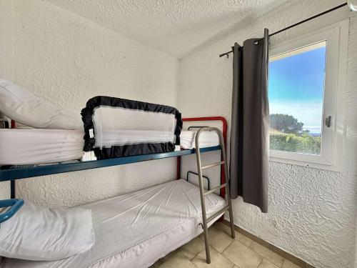 Postel nebo postele na pokoji v ubytování Appartement 6 couchages Lumio